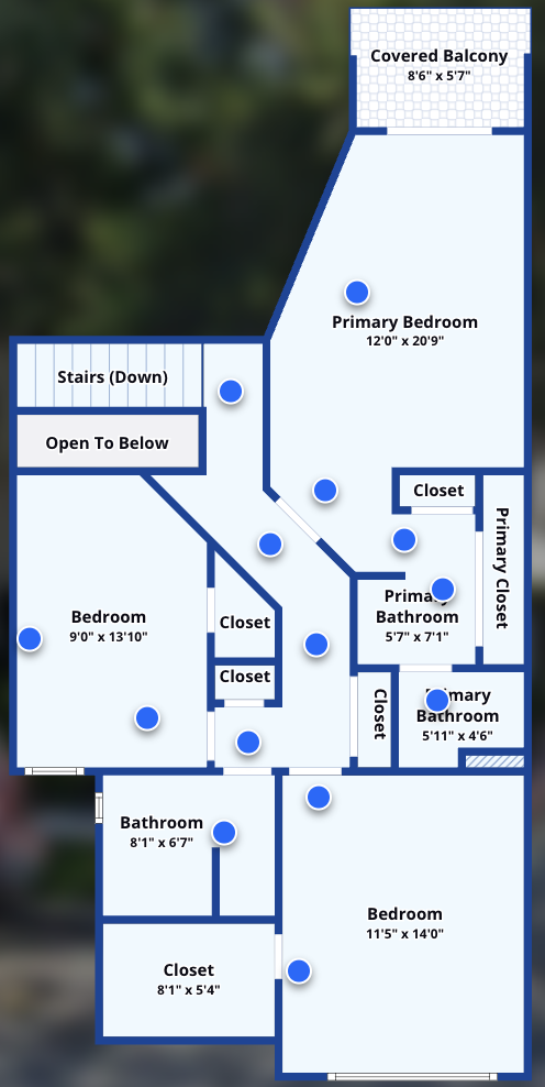 Upper level floor plan with the primary bedroom suite, two additional bedrooms, bathrooms, and covered balcony